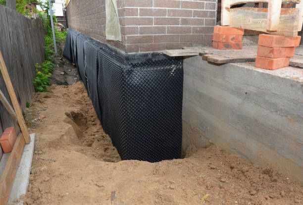 Happy homeowners after waterproofing job in Larwill